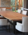Uniform gapped dining table with custom base