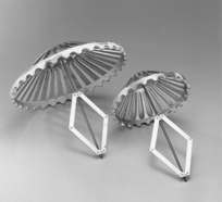 ADJUSTABLE DRAIN GUARDS ADJUSTABLE DRAIN GUARDS