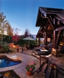 COPPER KIDNEY SHAPED SPA WITH BENCH SEATING AND DESCENDING STAIRWAY